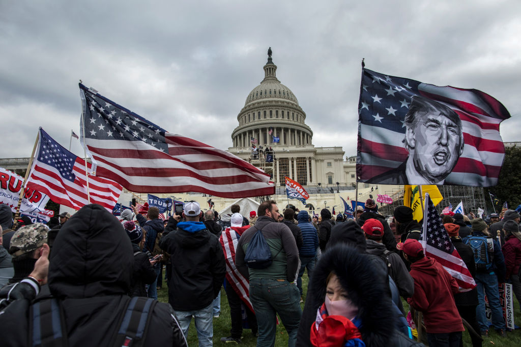 US President Donald Trump's supporters gather outside the...