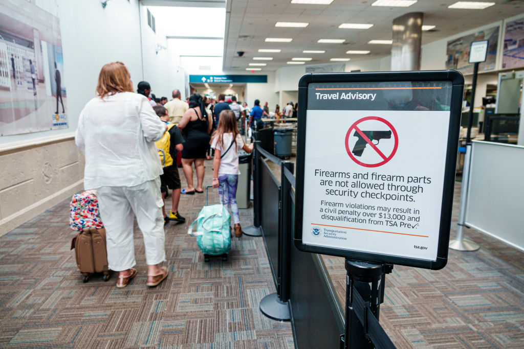 Florida, Fort Lauderdale, Airport TSA security screening checkpoint, information sign about firearms