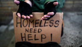 Homeless man begging for money on the street