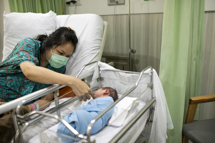 Mother with her newborn baby in the hospital