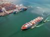 Aerial view Container cargo ship in the sea carrying to Terminal Port,Industry business logistic and transportation in Thailand