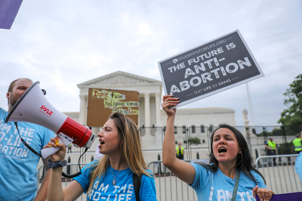 Pro-choice and pro-life activists protest