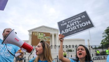 Pro-choice and pro-life activists protest