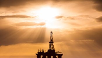 Oil platform at sea at sunset. World Oil Industry