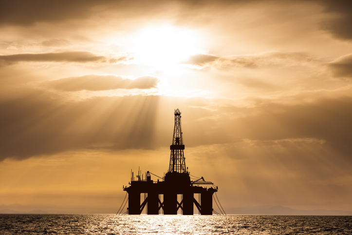 Oil platform at sea at sunset. World Oil Industry