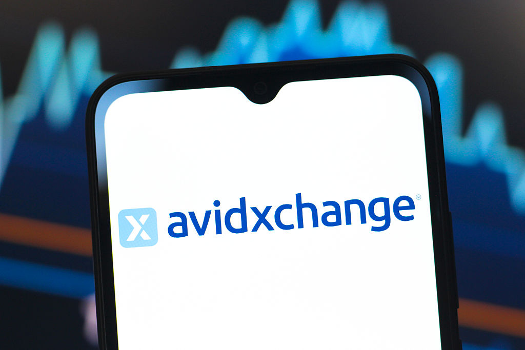 In this photo illustration, the AvidXchange Holdings logo is...